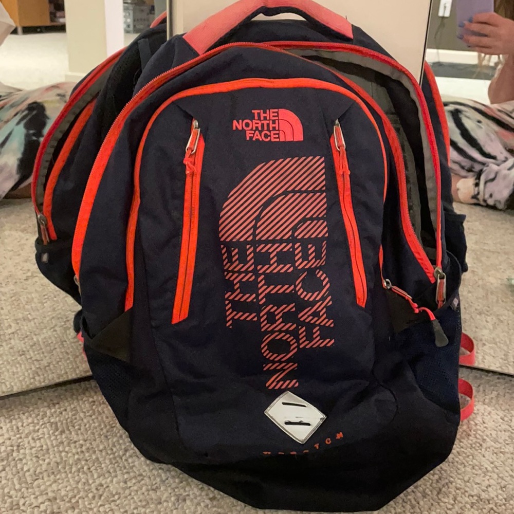 North face navy and pink backpack